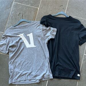 Lot two men’s Vuori T shirts, one black and one Heather gray. Size medium.
